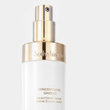 A close-up shows the gold-accented pump top and bottle of Sulwhasoo Concentrated Ginseng Brightening Serum, highlighting its elegant design and promising radiant, toned skin.